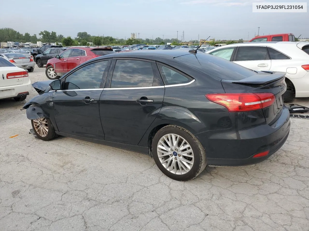 2015 Ford Focus Titanium VIN: 1FADP3J29FL231054 Lot: 67586214