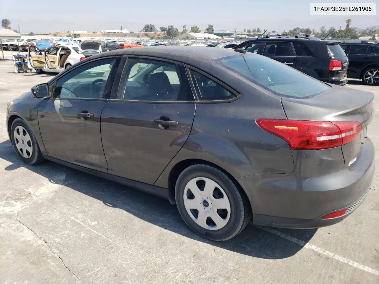 2015 Ford Focus S VIN: 1FADP3E25FL261906 Lot: 69163364