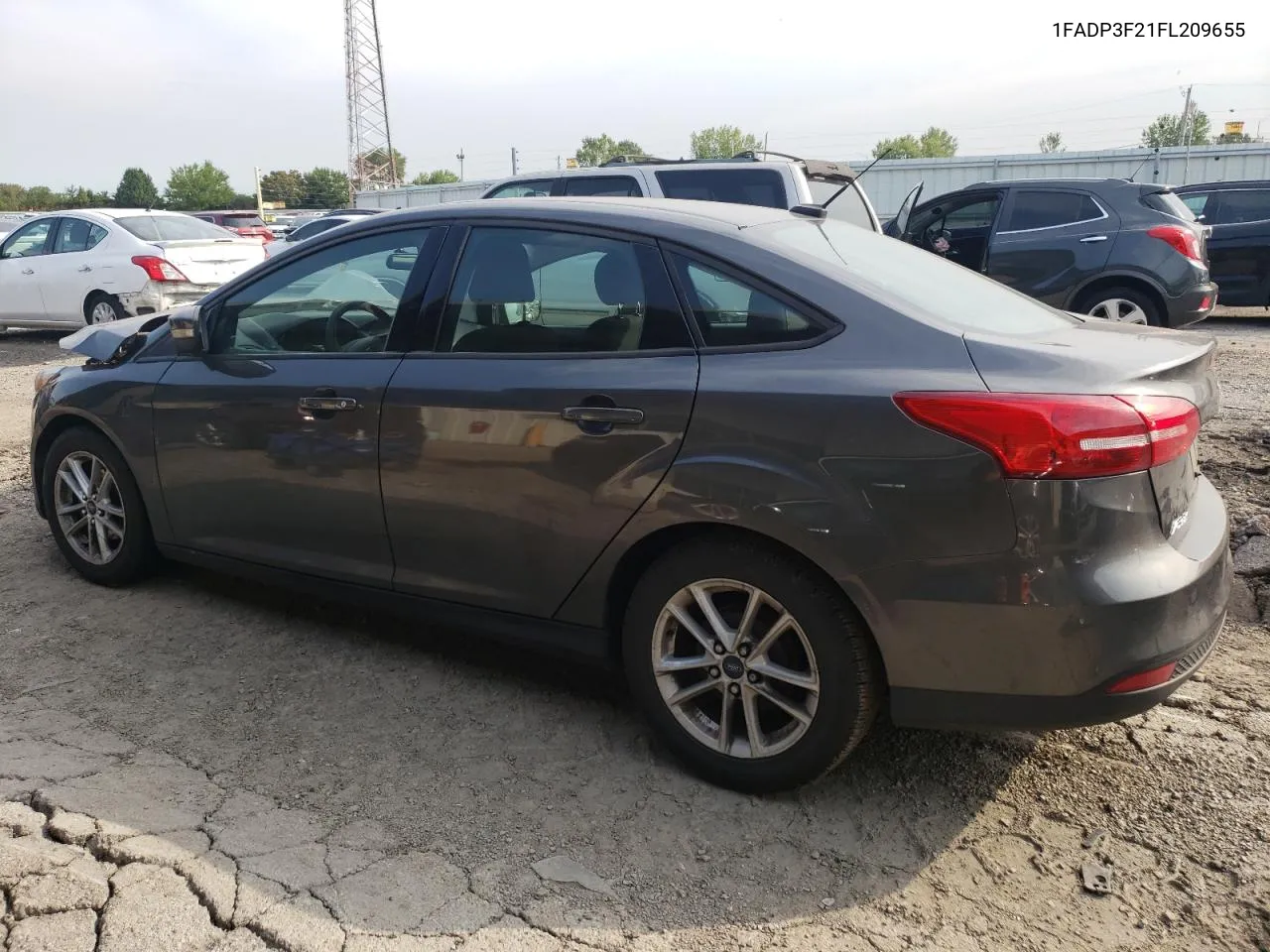 2015 Ford Focus Se VIN: 1FADP3F21FL209655 Lot: 69489174