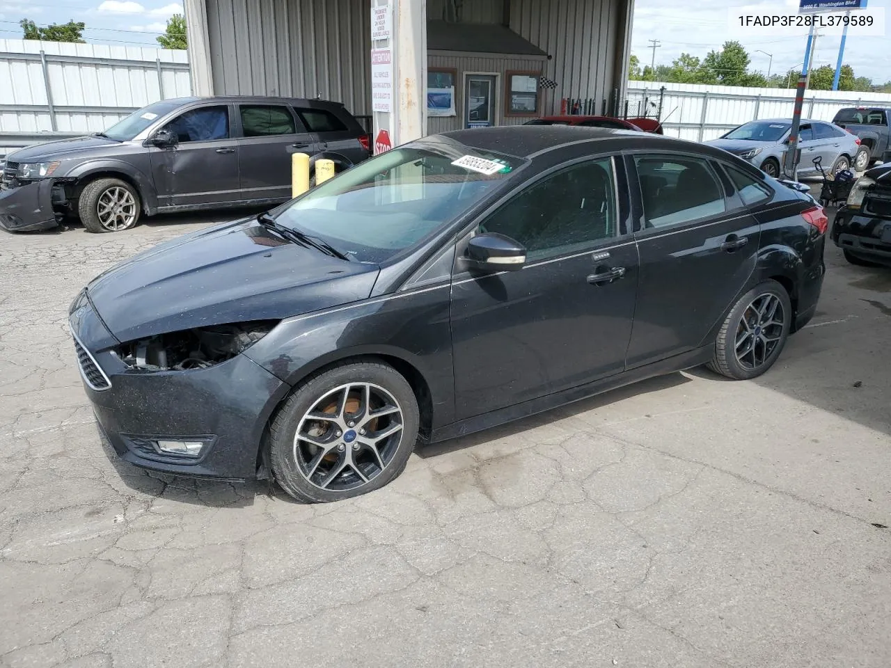 2015 Ford Focus Se VIN: 1FADP3F28FL379589 Lot: 69853204