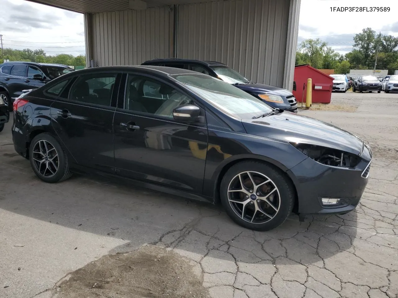 2015 Ford Focus Se VIN: 1FADP3F28FL379589 Lot: 69853204