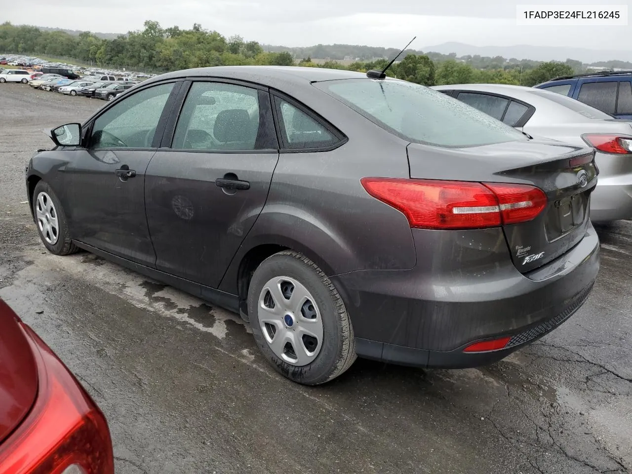 2015 Ford Focus S VIN: 1FADP3E24FL216245 Lot: 70665874