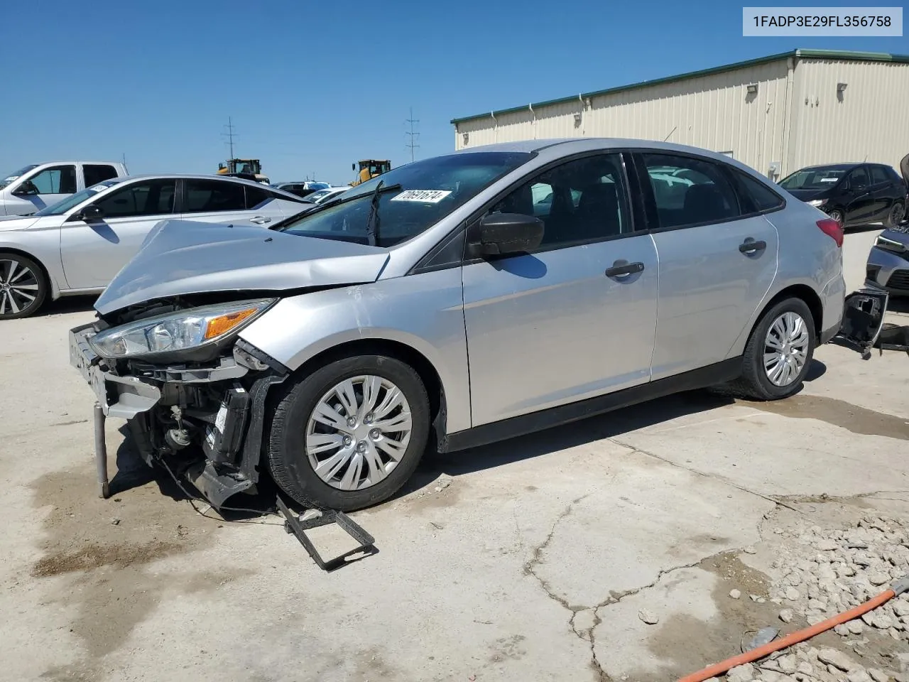 2015 Ford Focus S VIN: 1FADP3E29FL356758 Lot: 70691674