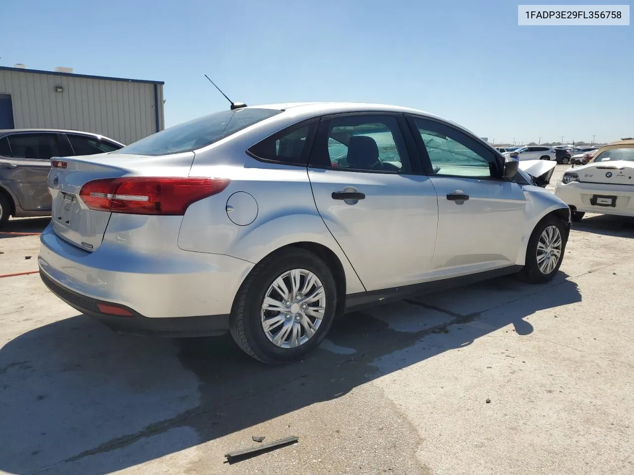 2015 Ford Focus S VIN: 1FADP3E29FL356758 Lot: 70691674