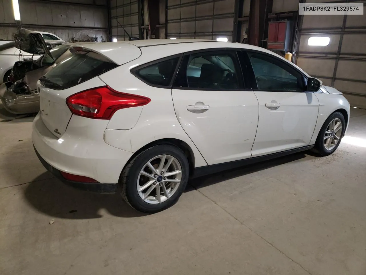 2015 Ford Focus Se VIN: 1FADP3K21FL329574 Lot: 70899994