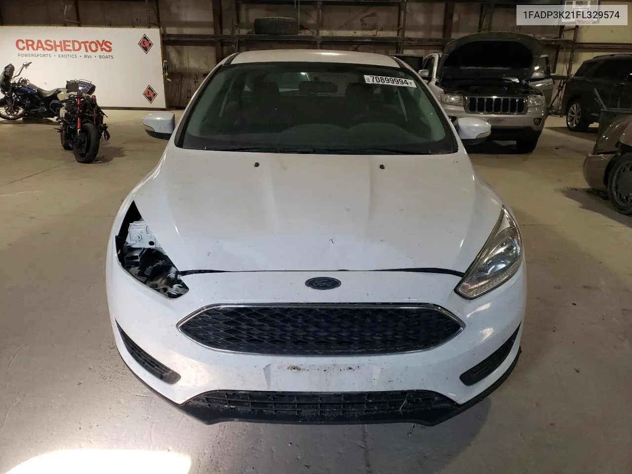 2015 Ford Focus Se VIN: 1FADP3K21FL329574 Lot: 70899994