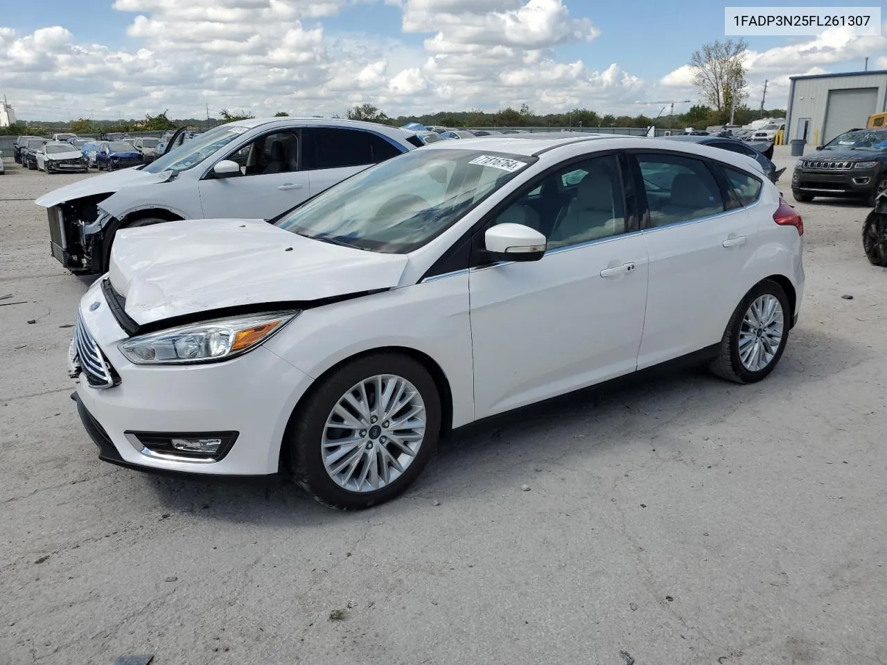 2015 Ford Focus Titanium VIN: 1FADP3N25FL261307 Lot: 71816764