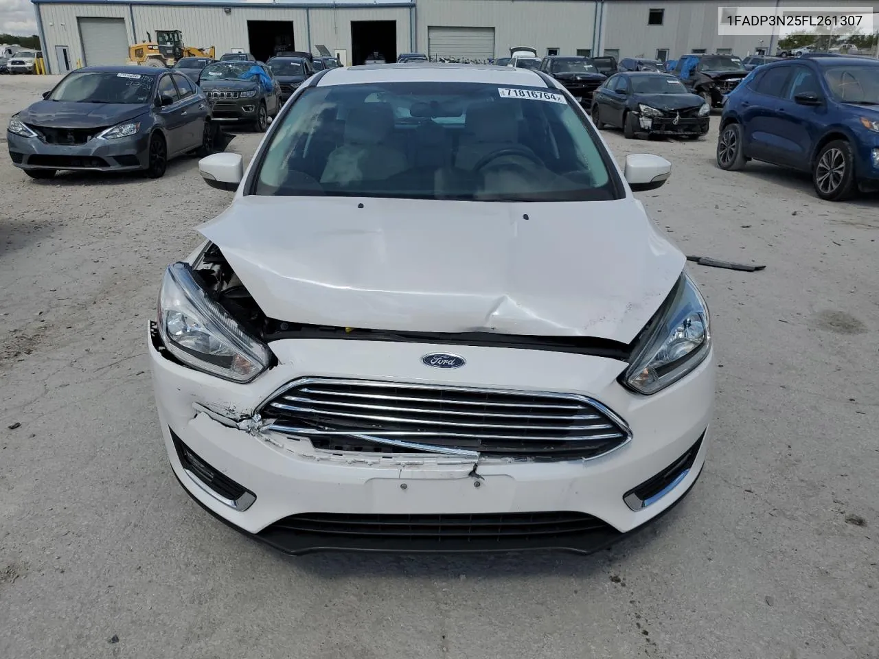 2015 Ford Focus Titanium VIN: 1FADP3N25FL261307 Lot: 71816764