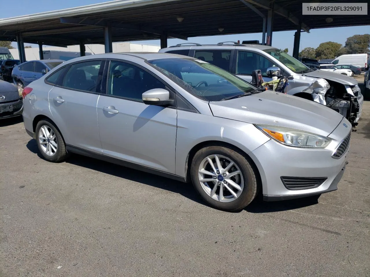 2015 Ford Focus Se VIN: 1FADP3F20FL329091 Lot: 72780144