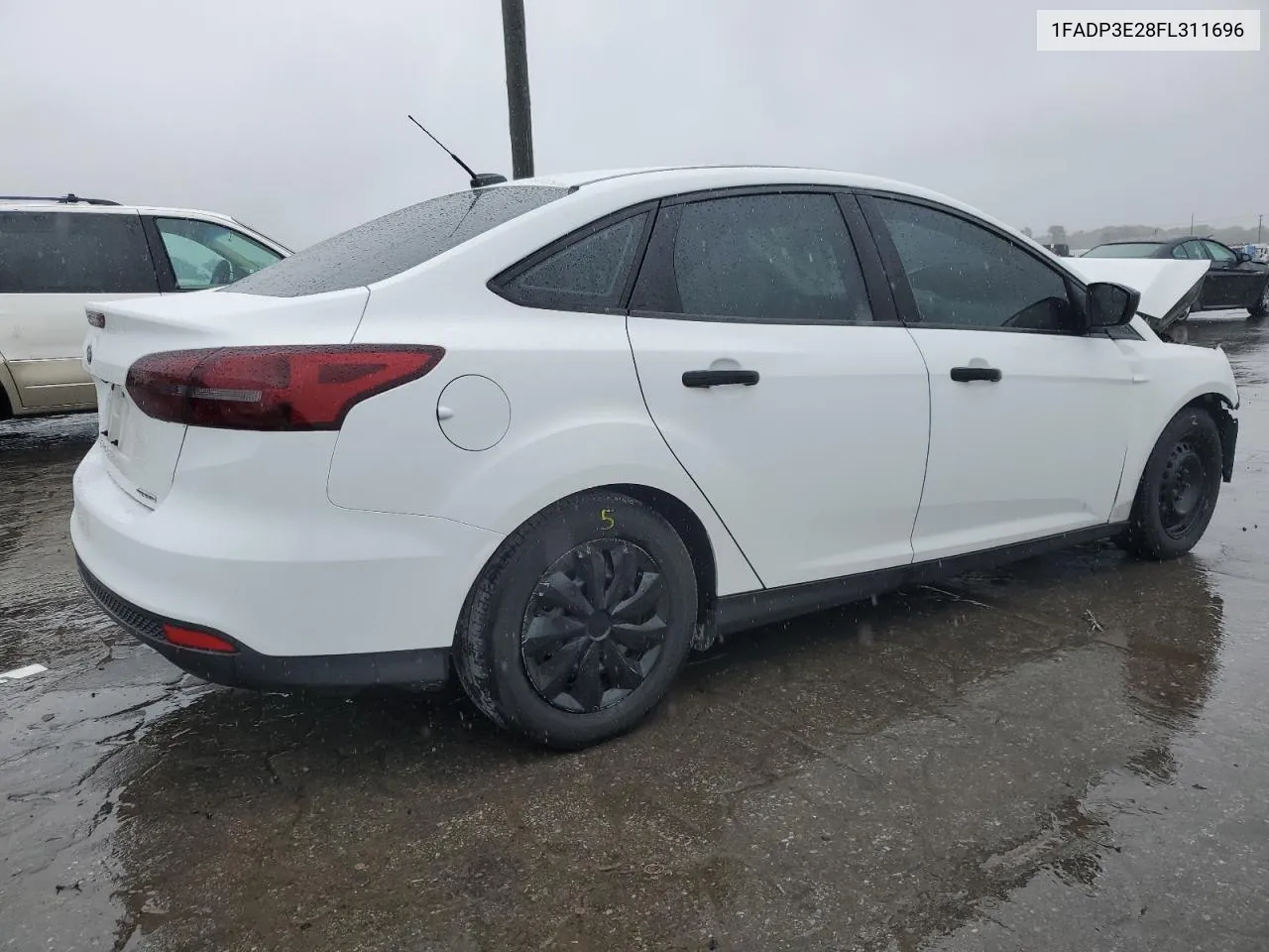 2015 Ford Focus S VIN: 1FADP3E28FL311696 Lot: 73382464