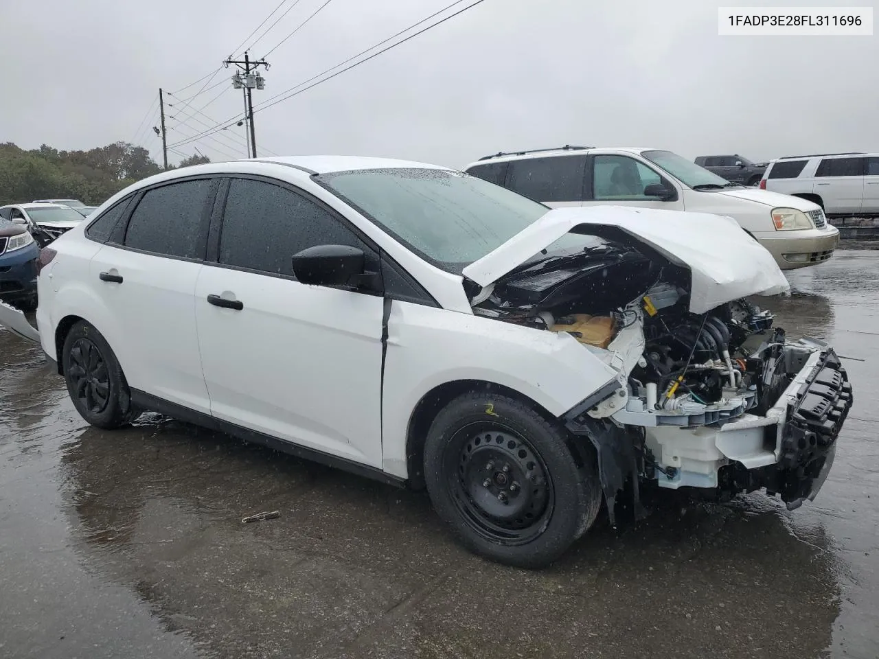 2015 Ford Focus S VIN: 1FADP3E28FL311696 Lot: 73382464