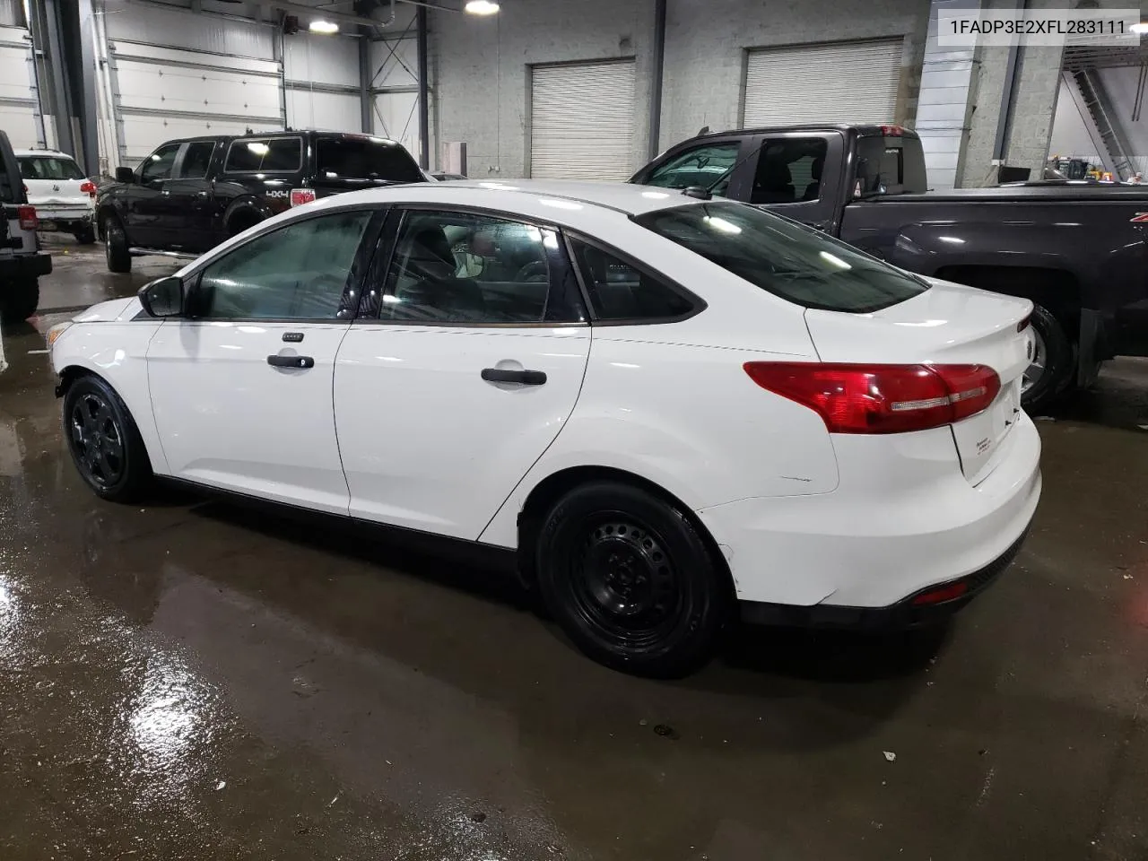 2015 Ford Focus S VIN: 1FADP3E2XFL283111 Lot: 73561874