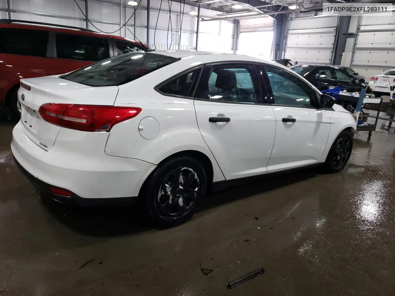 2015 Ford Focus S VIN: 1FADP3E2XFL283111 Lot: 73561874