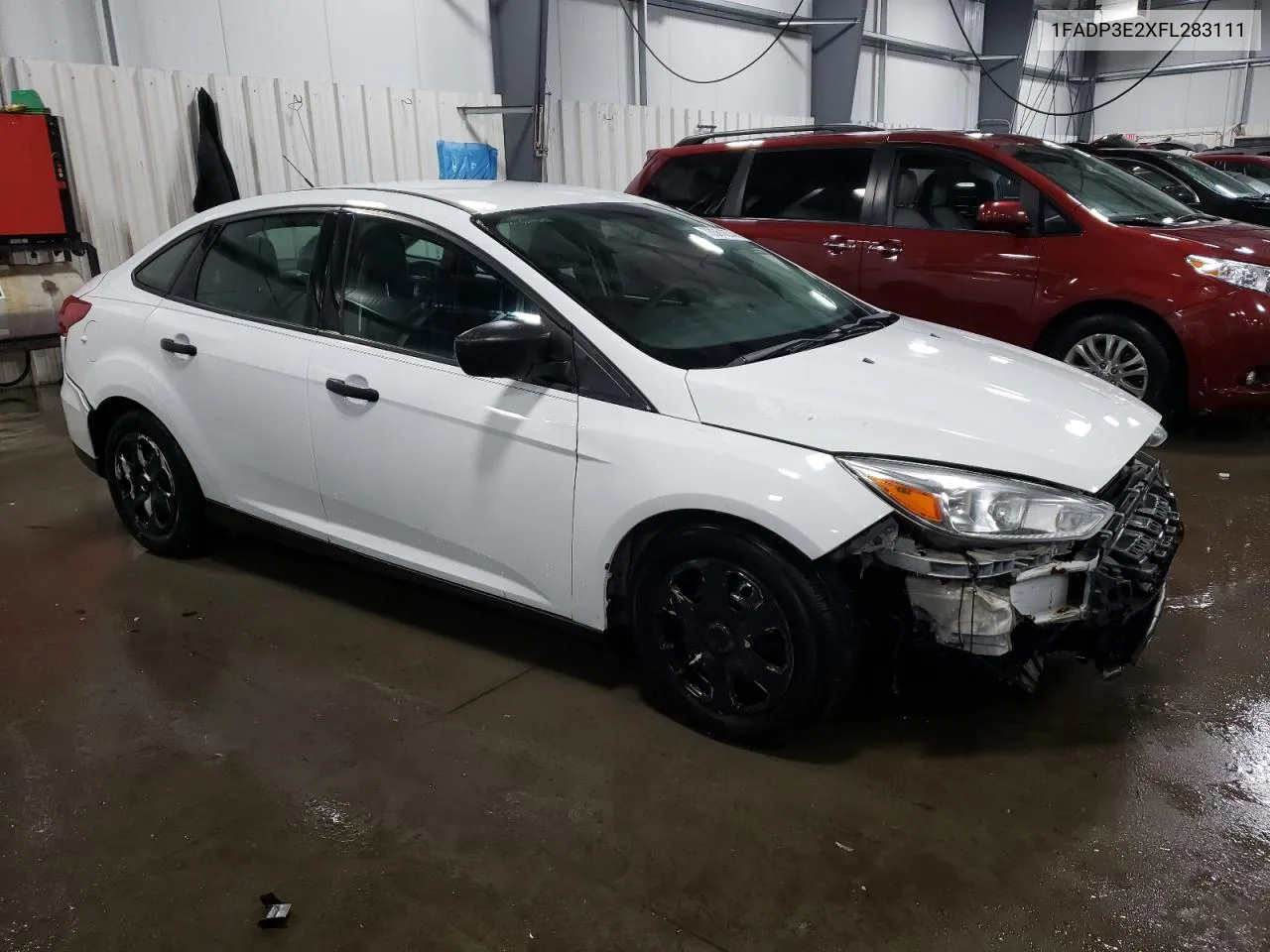 2015 Ford Focus S VIN: 1FADP3E2XFL283111 Lot: 73561874