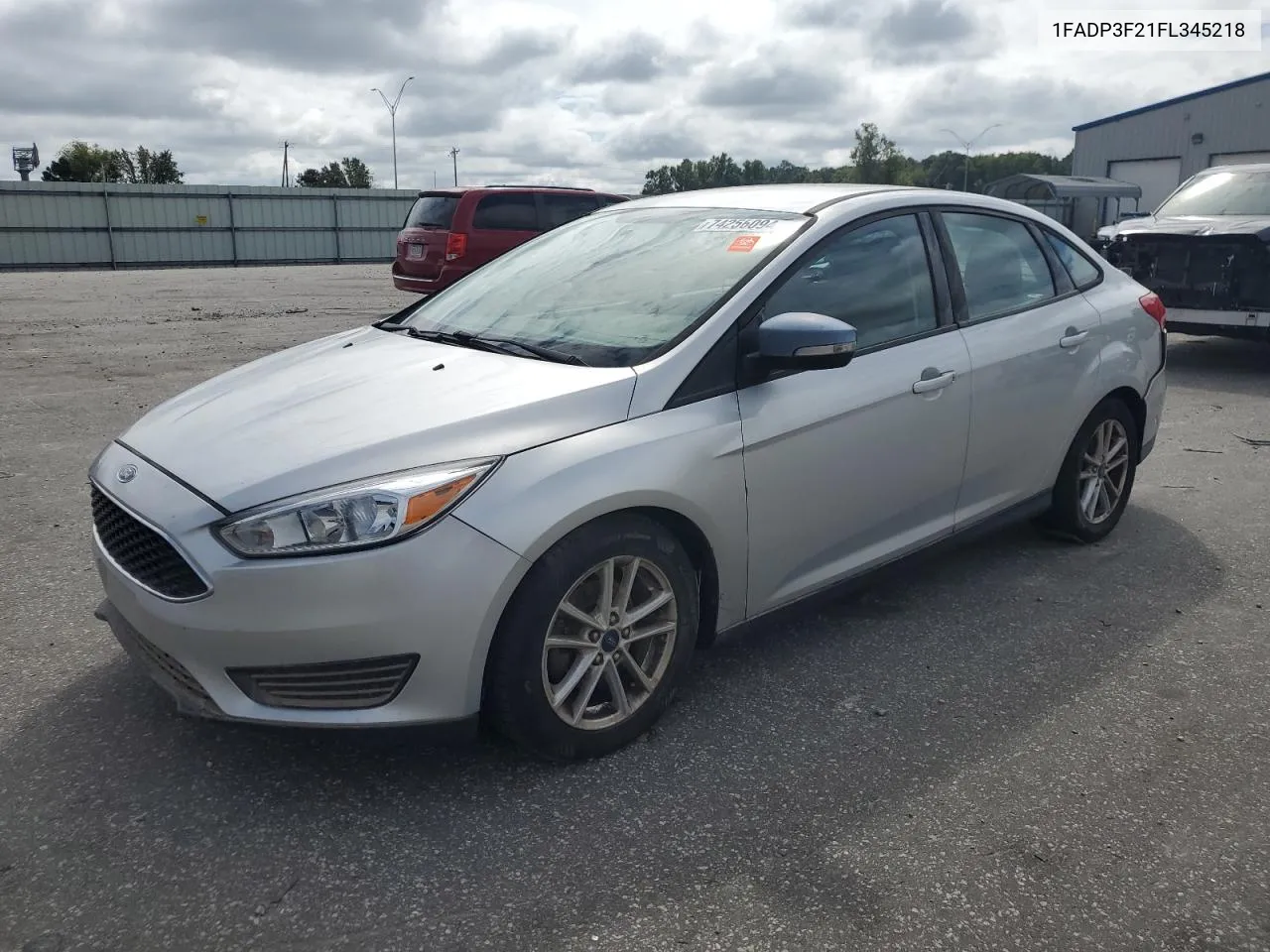 2015 Ford Focus Se VIN: 1FADP3F21FL345218 Lot: 74256094