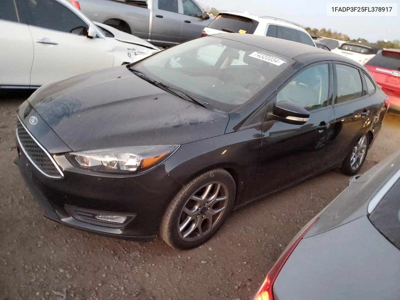 2015 Ford Focus Se VIN: 1FADP3F25FL378917 Lot: 74320034