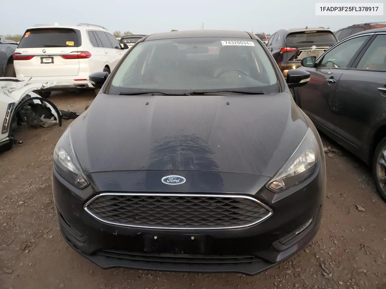 2015 Ford Focus Se VIN: 1FADP3F25FL378917 Lot: 74320034