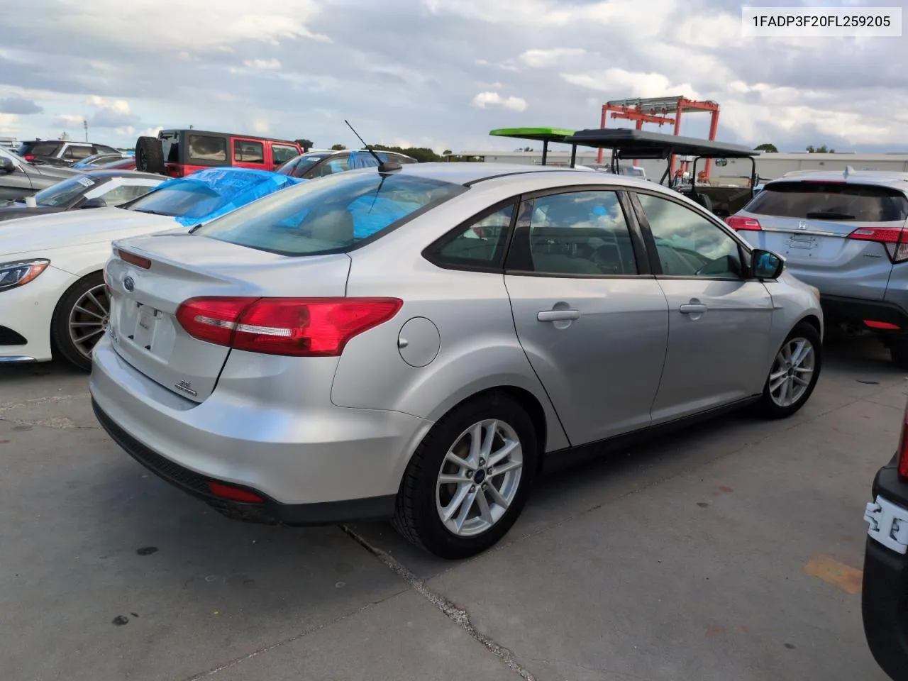 2015 Ford Focus Se VIN: 1FADP3F20FL259205 Lot: 74990434