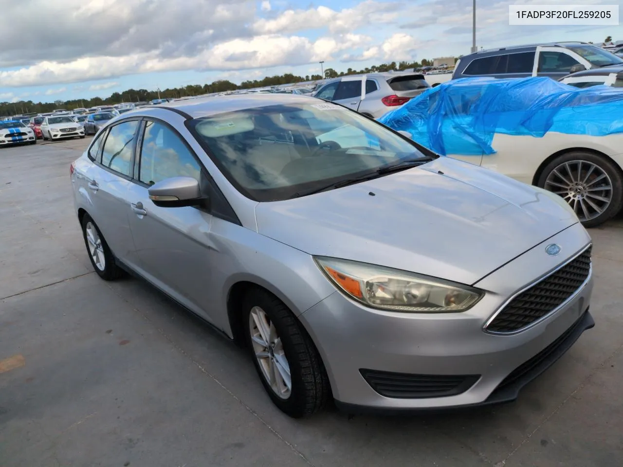 2015 Ford Focus Se VIN: 1FADP3F20FL259205 Lot: 74990434