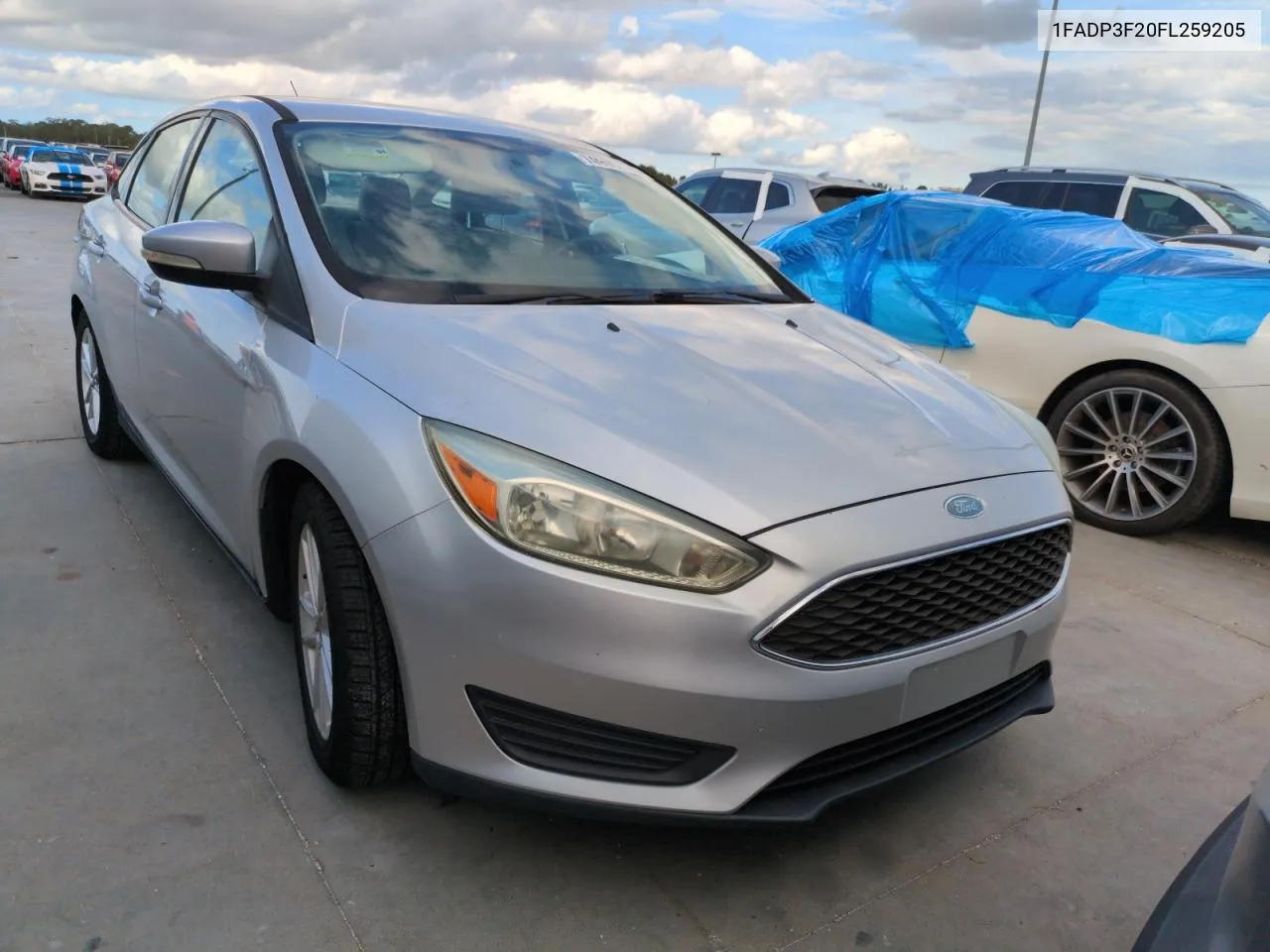 2015 Ford Focus Se VIN: 1FADP3F20FL259205 Lot: 74990434