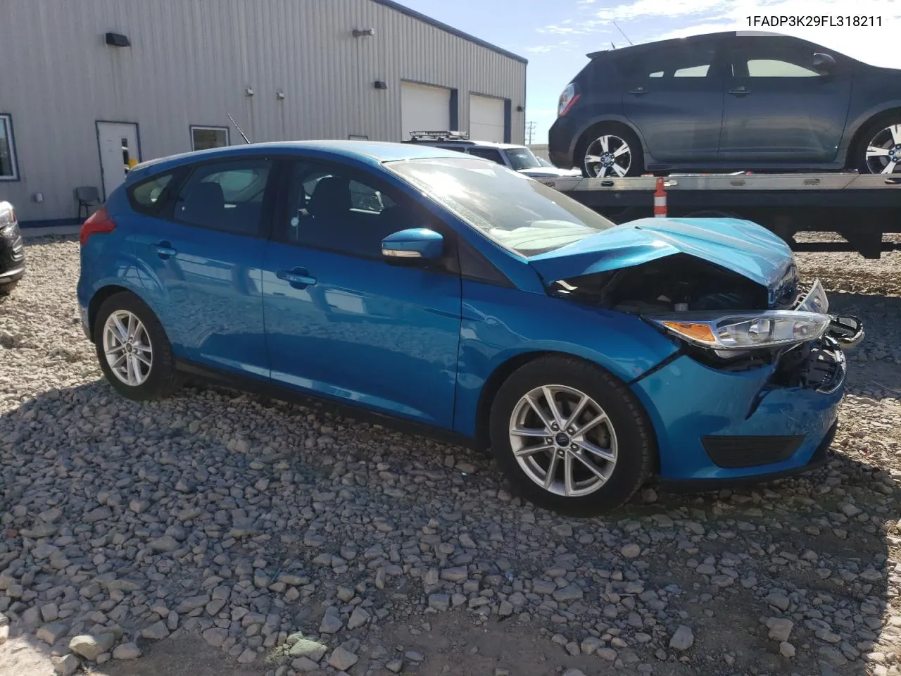 2015 Ford Focus Se VIN: 1FADP3K29FL318211 Lot: 75204924