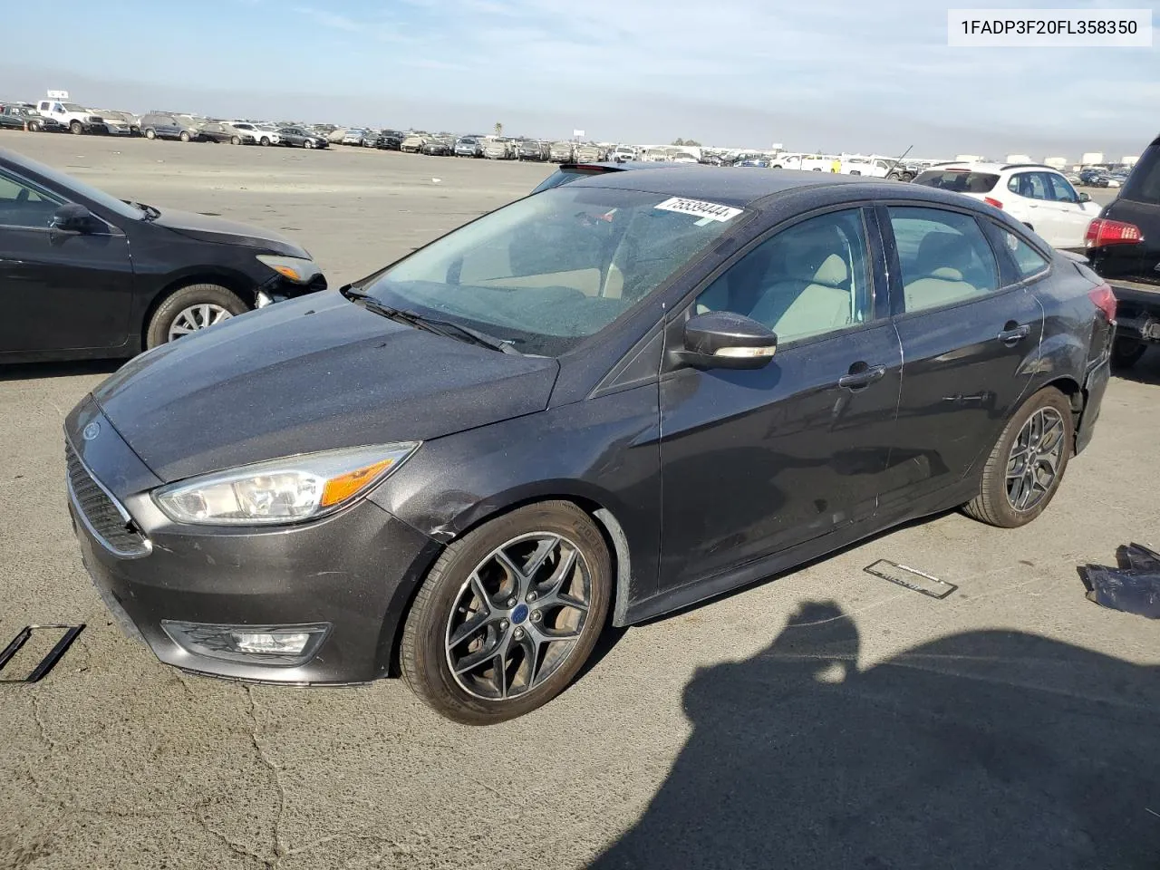 2015 Ford Focus Se VIN: 1FADP3F20FL358350 Lot: 75539444