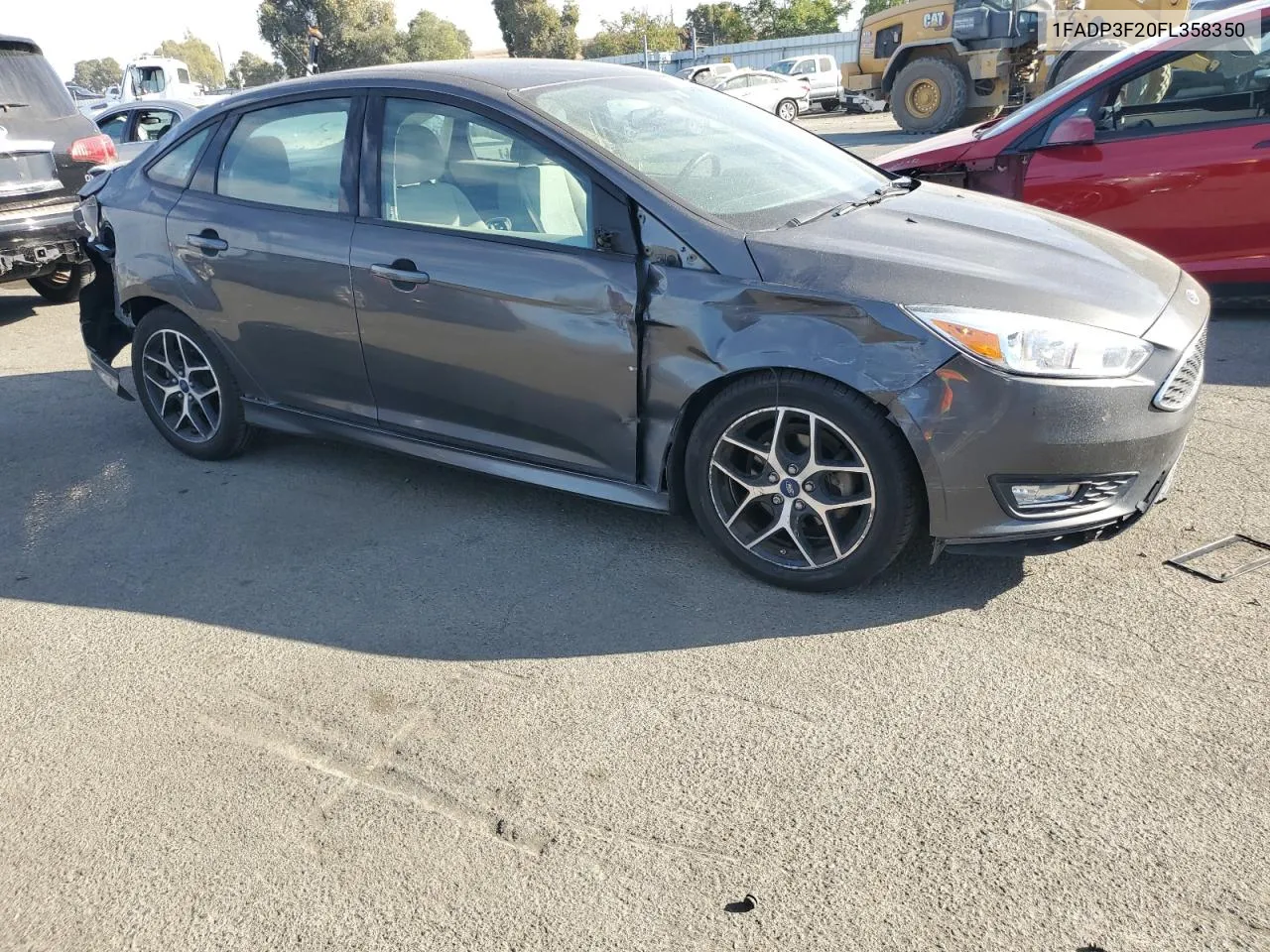 2015 Ford Focus Se VIN: 1FADP3F20FL358350 Lot: 75539444