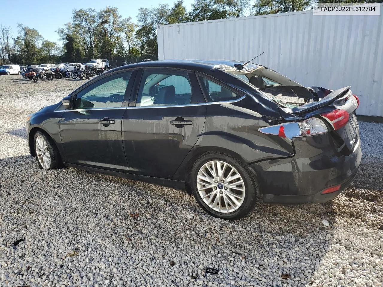 2015 Ford Focus Titanium VIN: 1FADP3J22FL312784 Lot: 75740274