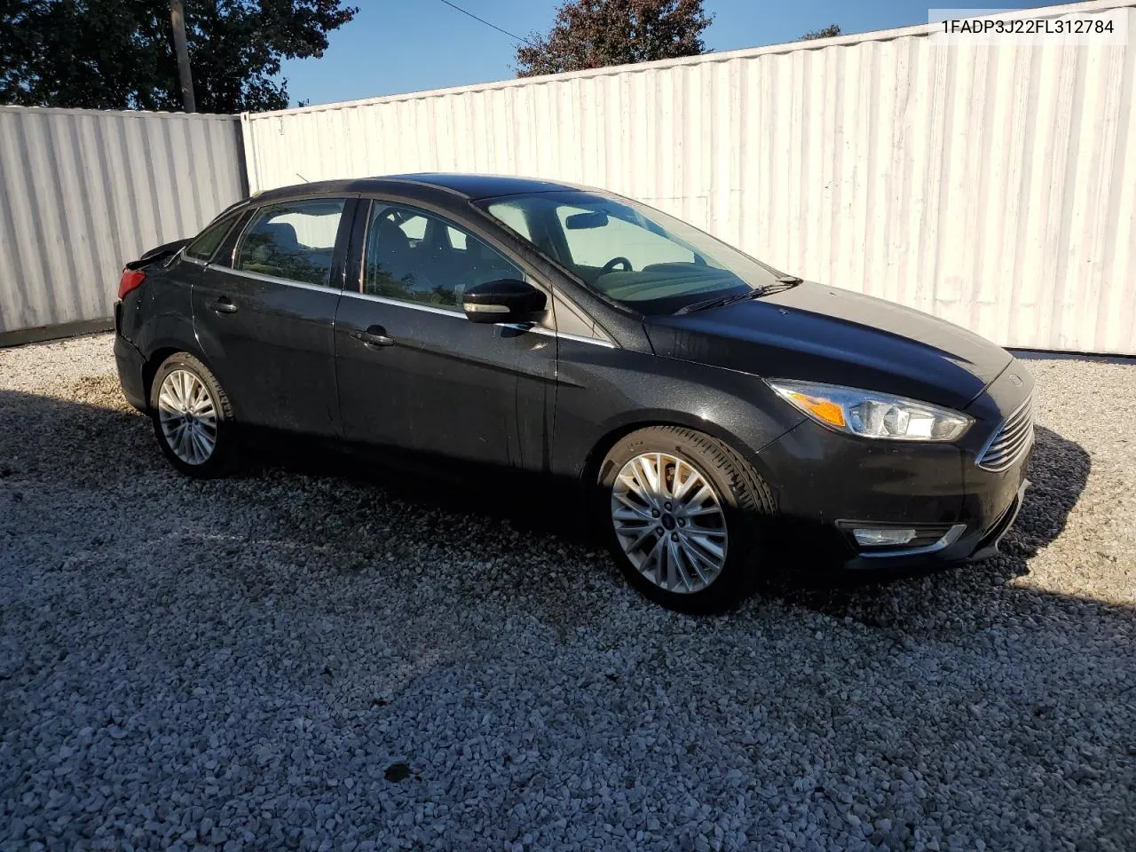 2015 Ford Focus Titanium VIN: 1FADP3J22FL312784 Lot: 75740274