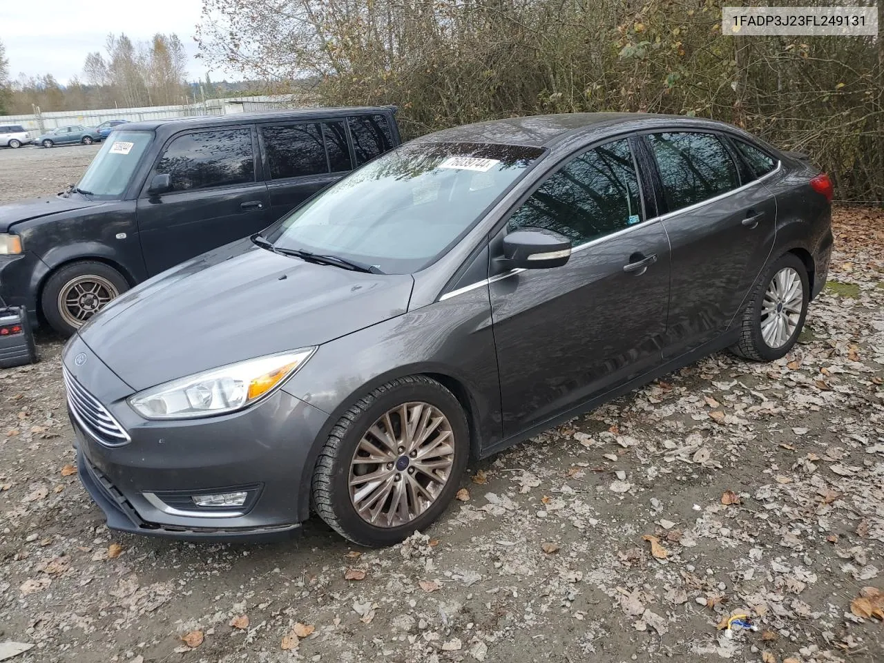 2015 Ford Focus Titanium VIN: 1FADP3J23FL249131 Lot: 76039744