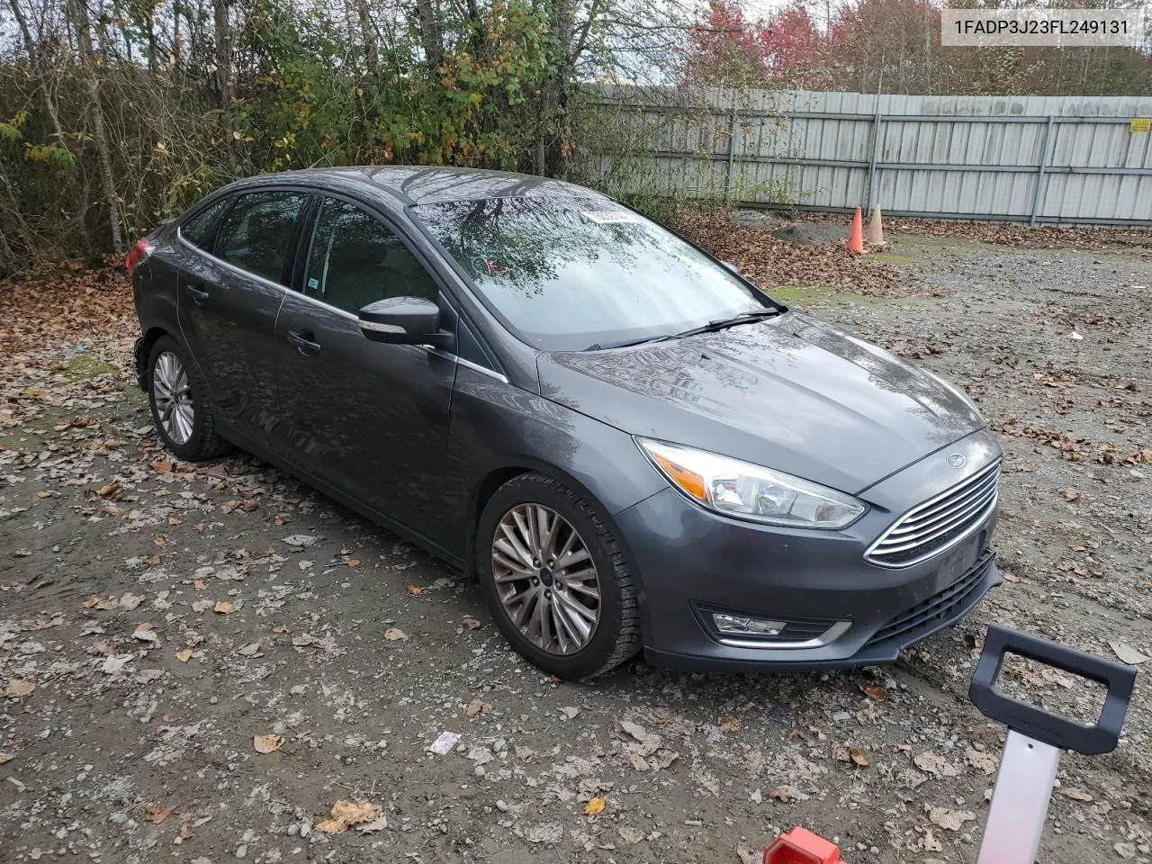 2015 Ford Focus Titanium VIN: 1FADP3J23FL249131 Lot: 76039744