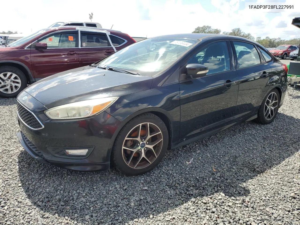 2015 Ford Focus Se VIN: 1FADP3F28FL227991 Lot: 76139444