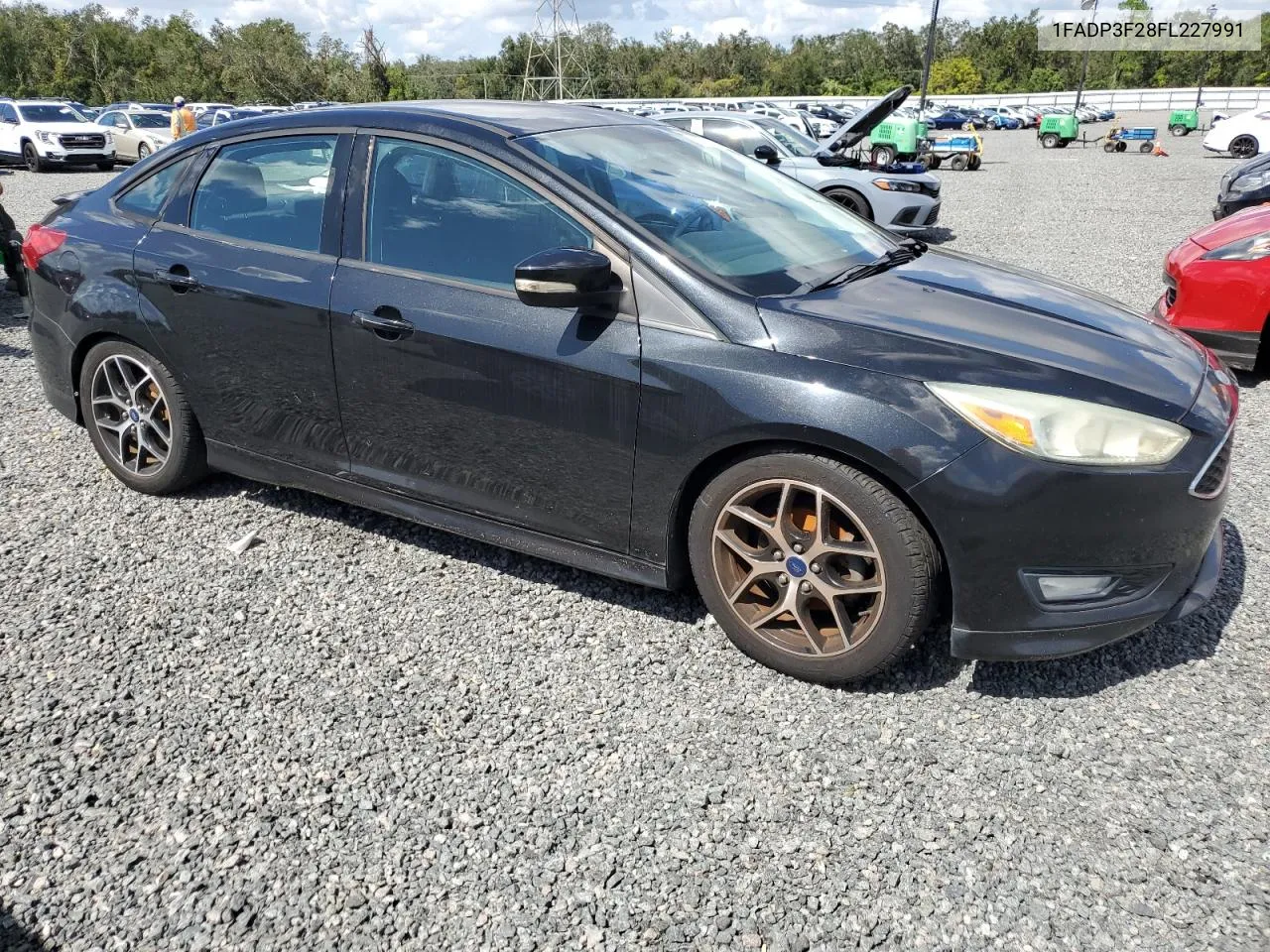 2015 Ford Focus Se VIN: 1FADP3F28FL227991 Lot: 76139444