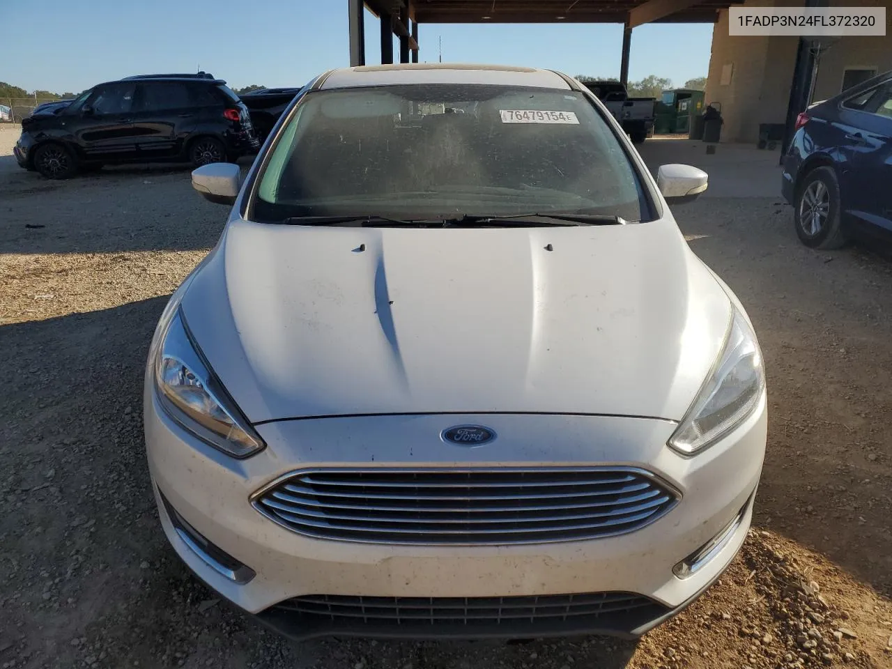 2015 Ford Focus Titanium VIN: 1FADP3N24FL372320 Lot: 76479154