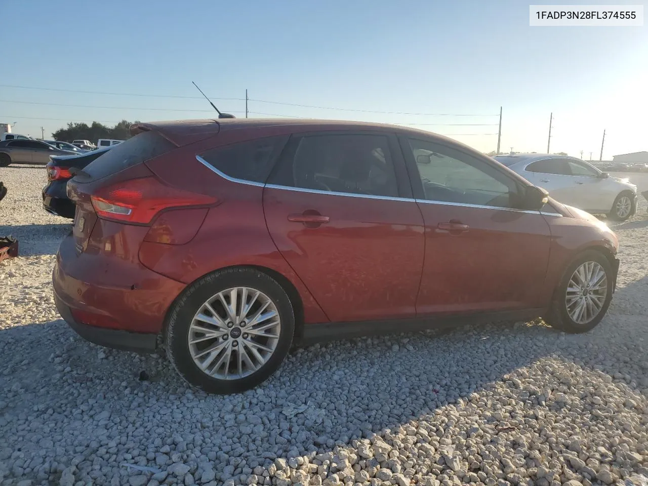 2015 Ford Focus Titanium VIN: 1FADP3N28FL374555 Lot: 79706954