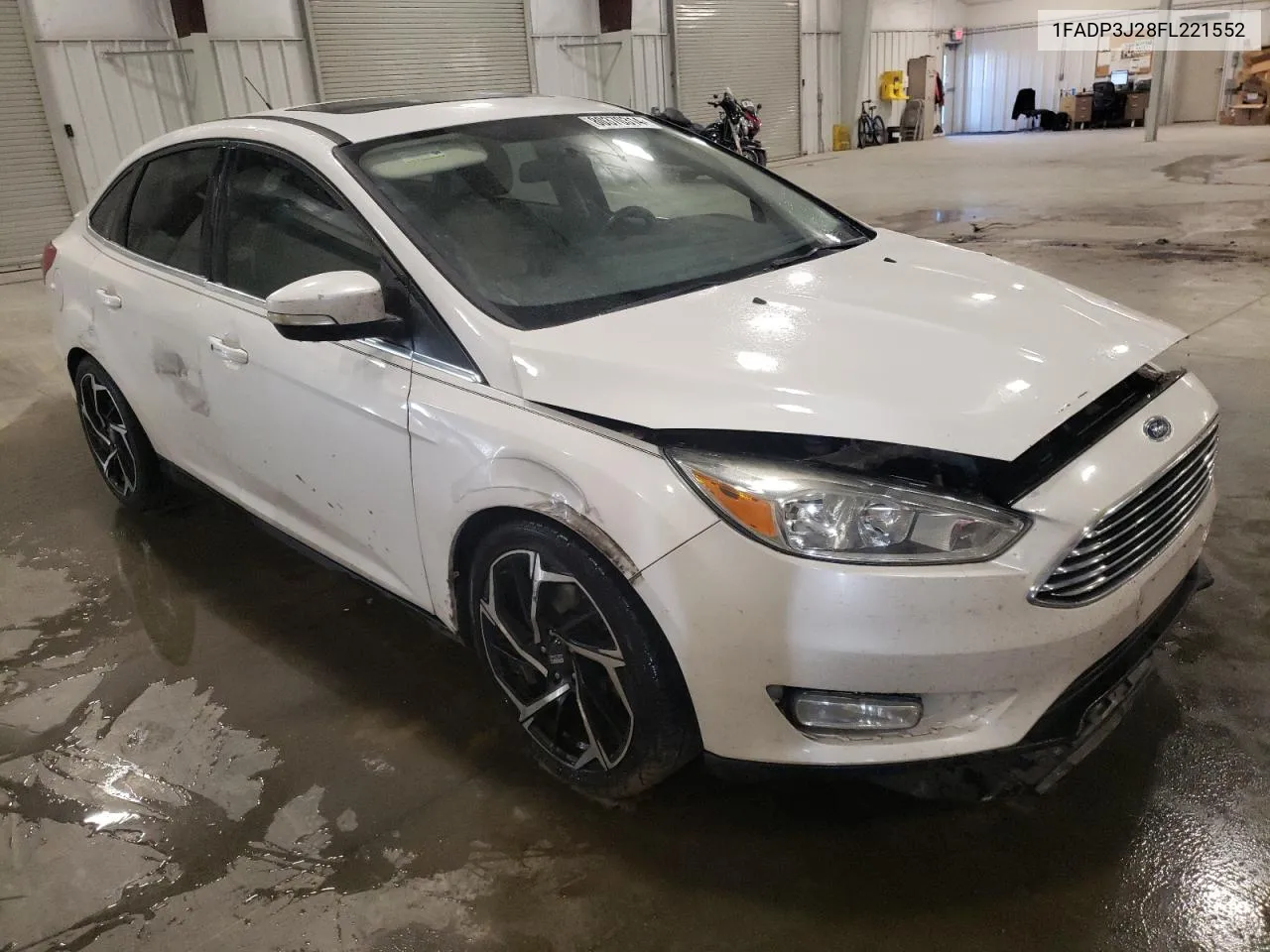 2015 Ford Focus Titanium VIN: 1FADP3J28FL221552 Lot: 80370314