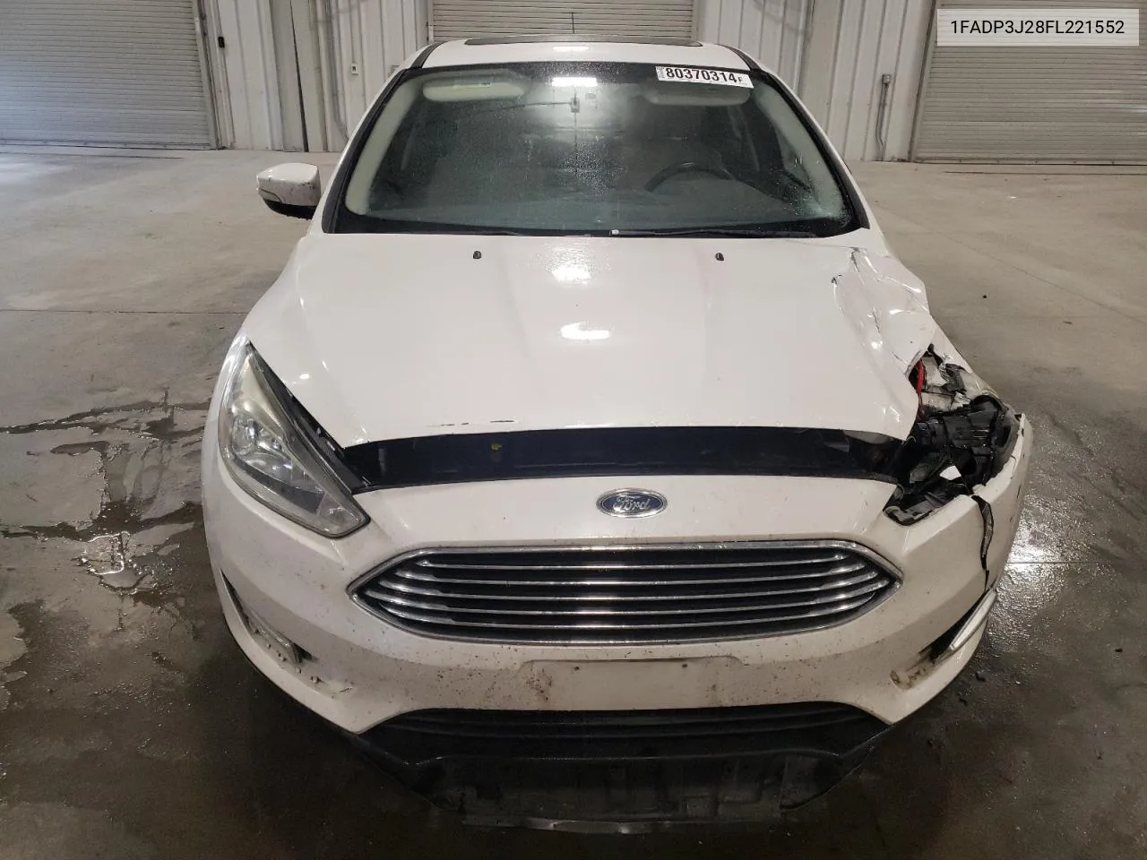 2015 Ford Focus Titanium VIN: 1FADP3J28FL221552 Lot: 80370314