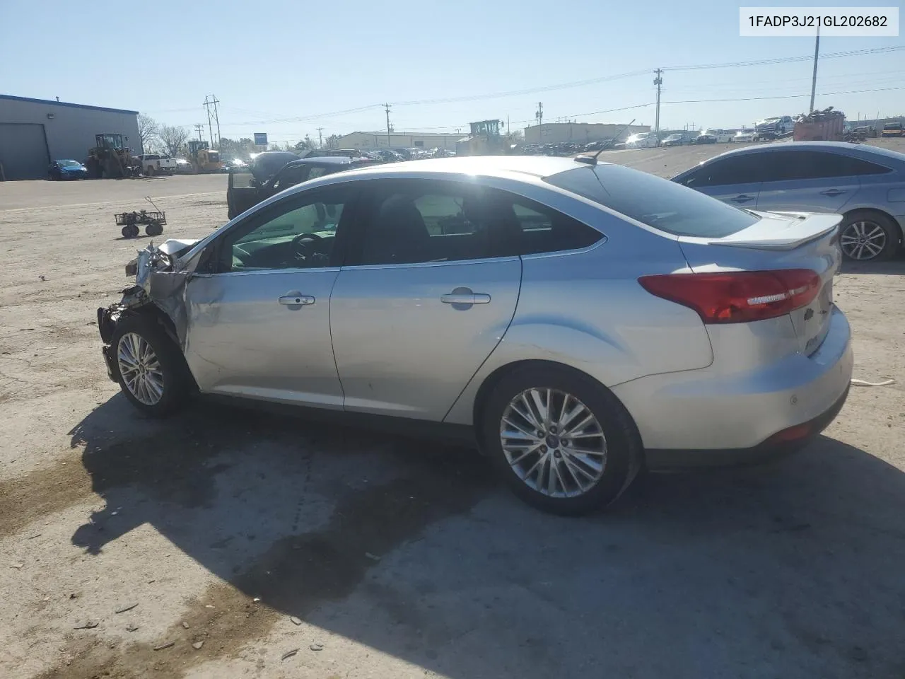 2016 Ford Focus Titanium VIN: 1FADP3J21GL202682 Lot: 46351844