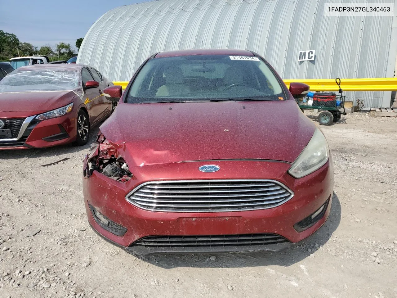 2016 Ford Focus Titanium VIN: 1FADP3N27GL340463 Lot: 57401034