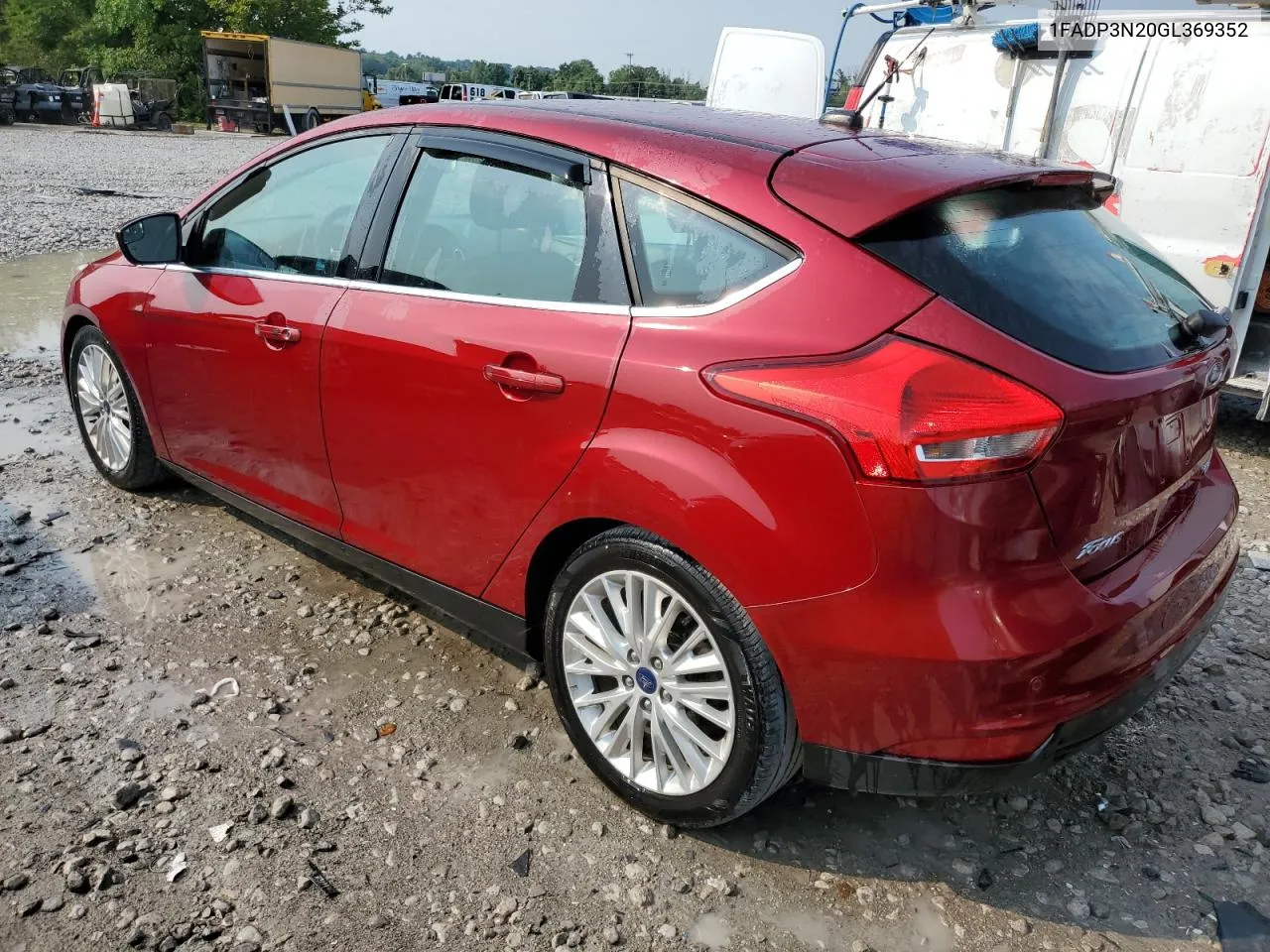 2016 Ford Focus Titanium VIN: 1FADP3N20GL369352 Lot: 63538114