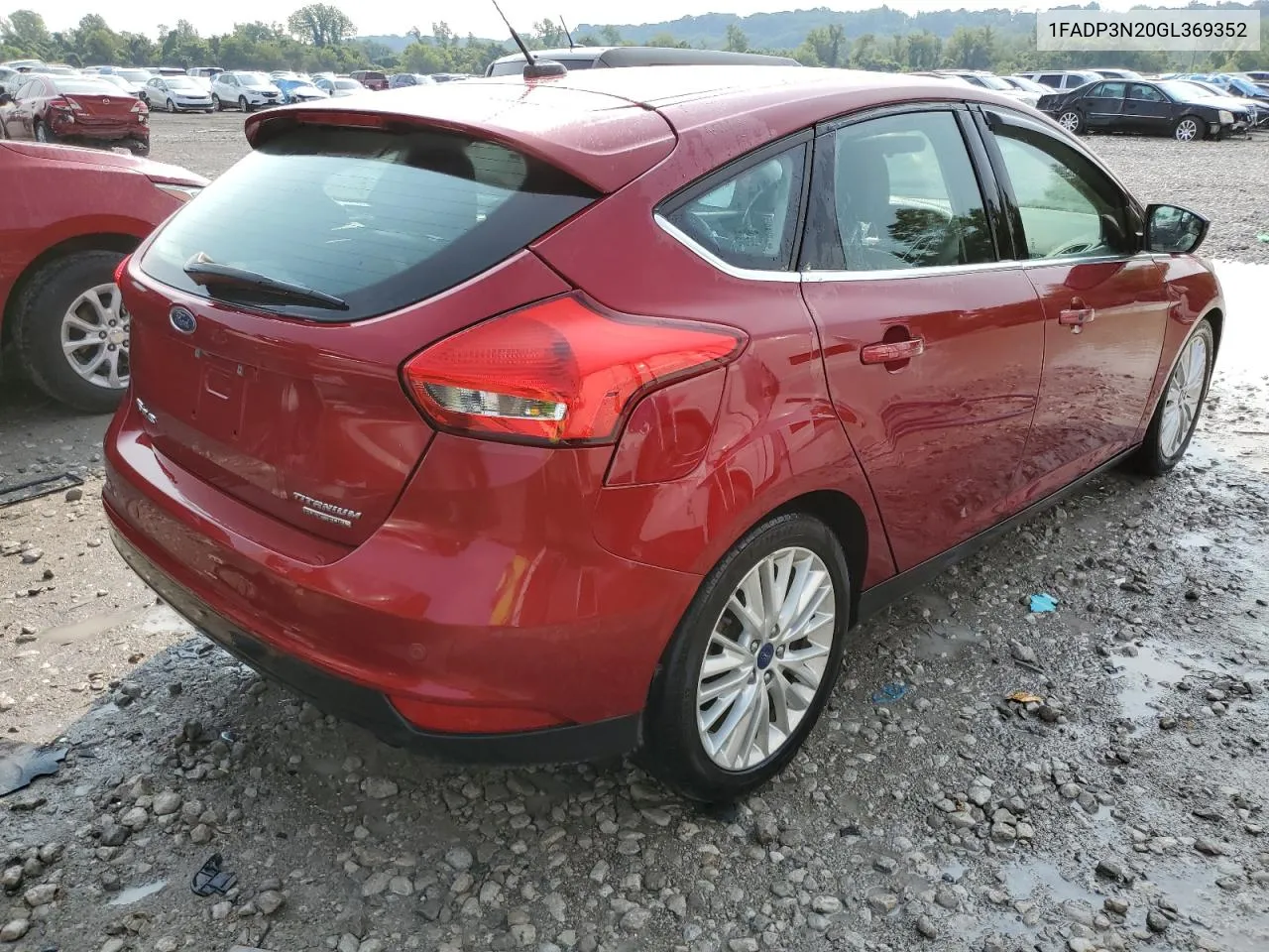 2016 Ford Focus Titanium VIN: 1FADP3N20GL369352 Lot: 63538114