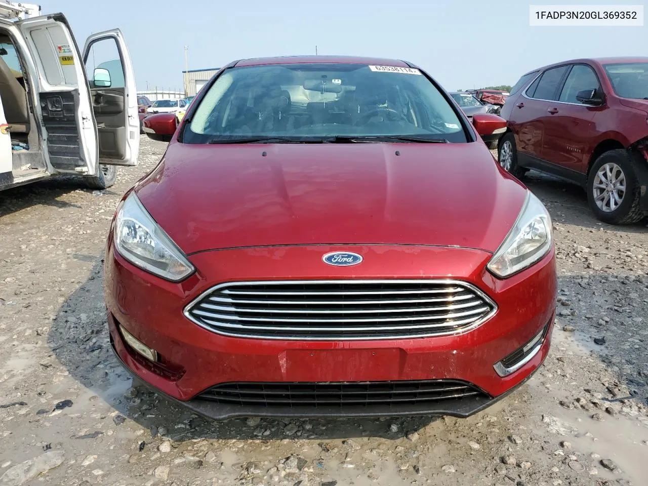 2016 Ford Focus Titanium VIN: 1FADP3N20GL369352 Lot: 63538114