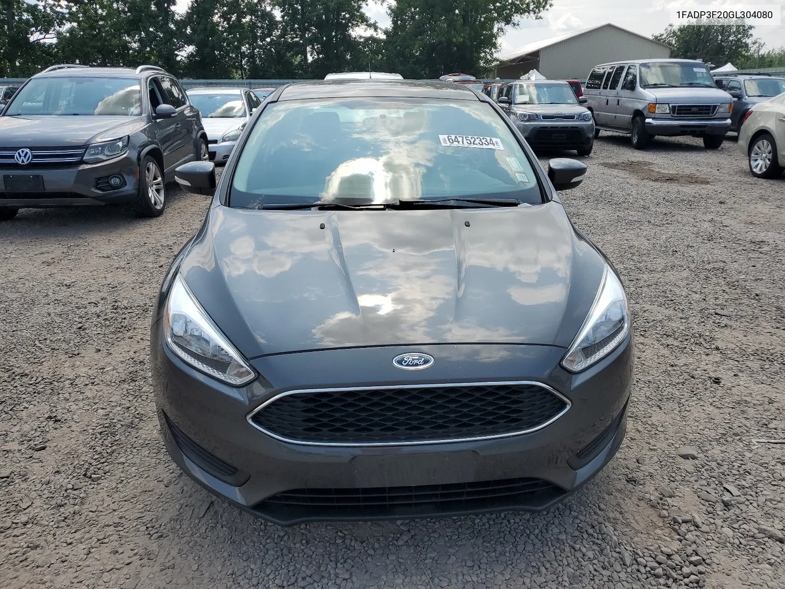 2016 Ford Focus Se VIN: 1FADP3F20GL304080 Lot: 64752334