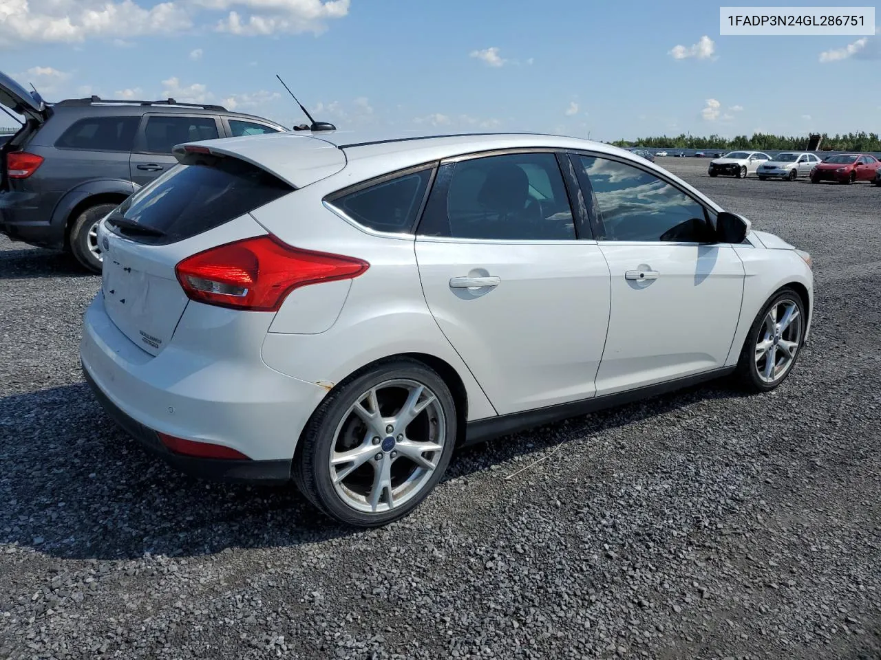 2016 Ford Focus Titanium VIN: 1FADP3N24GL286751 Lot: 68925564