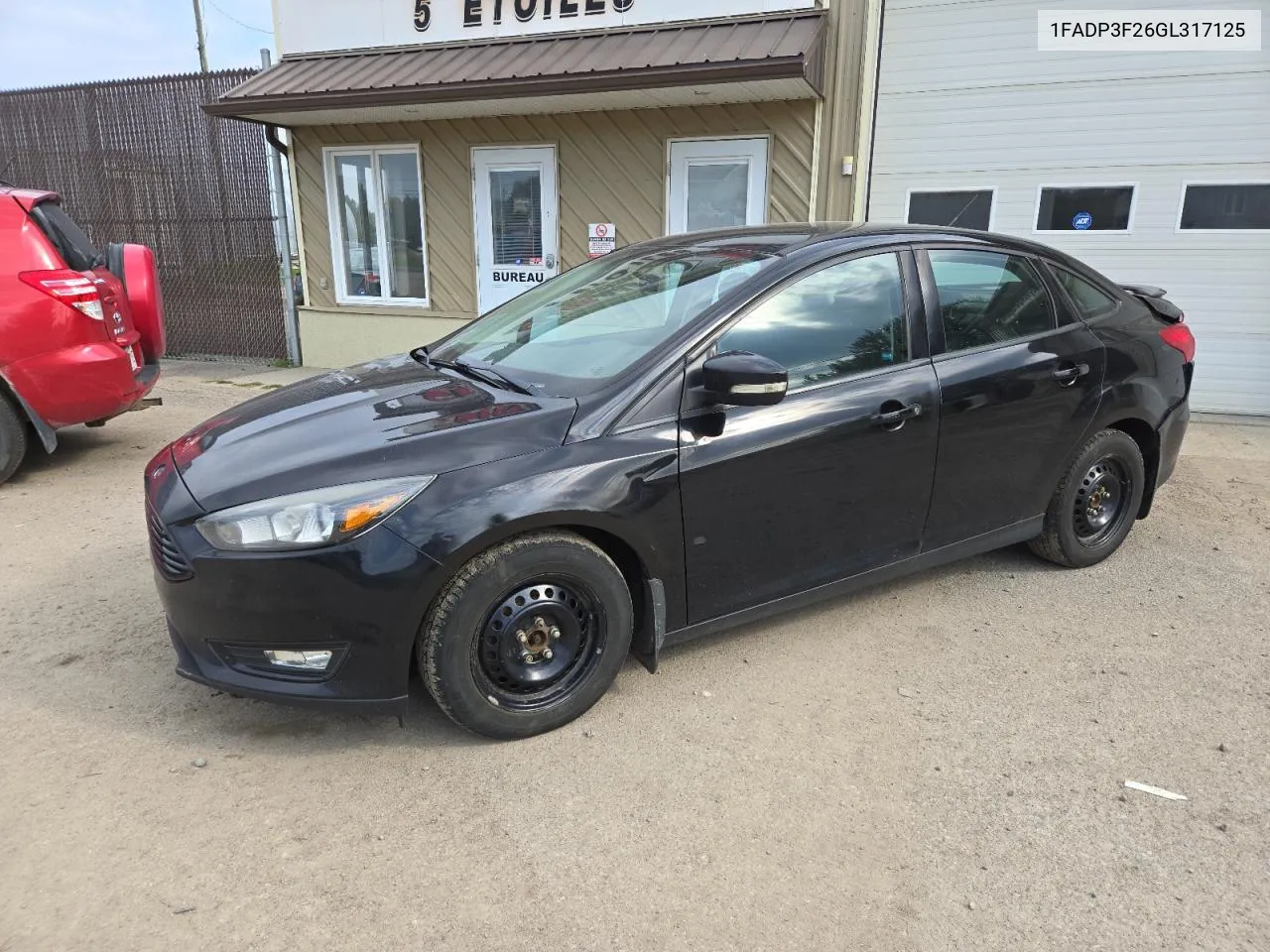 2016 Ford Focus Se VIN: 1FADP3F26GL317125 Lot: 69449624