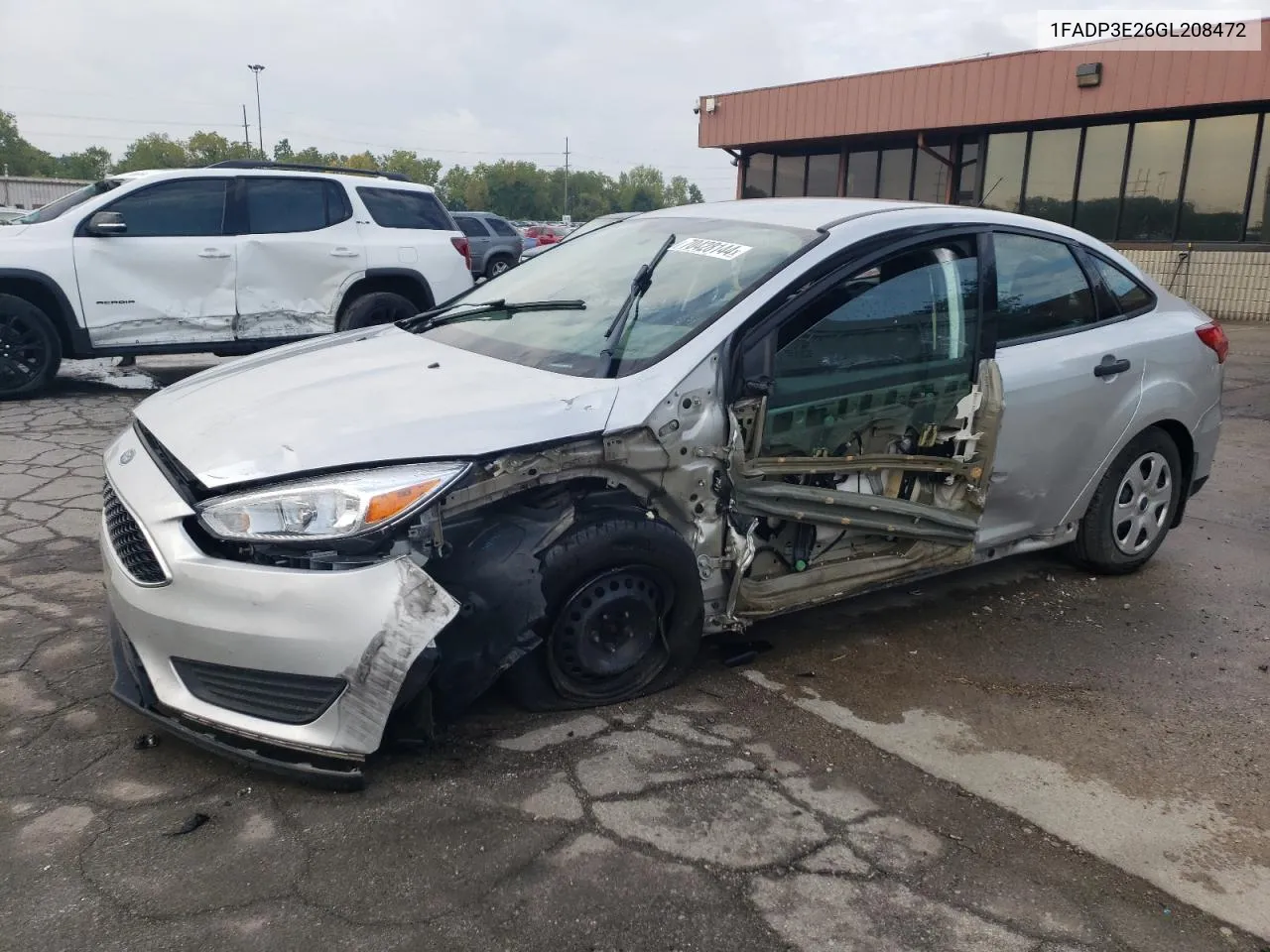 2016 Ford Focus S VIN: 1FADP3E26GL208472 Lot: 70428144