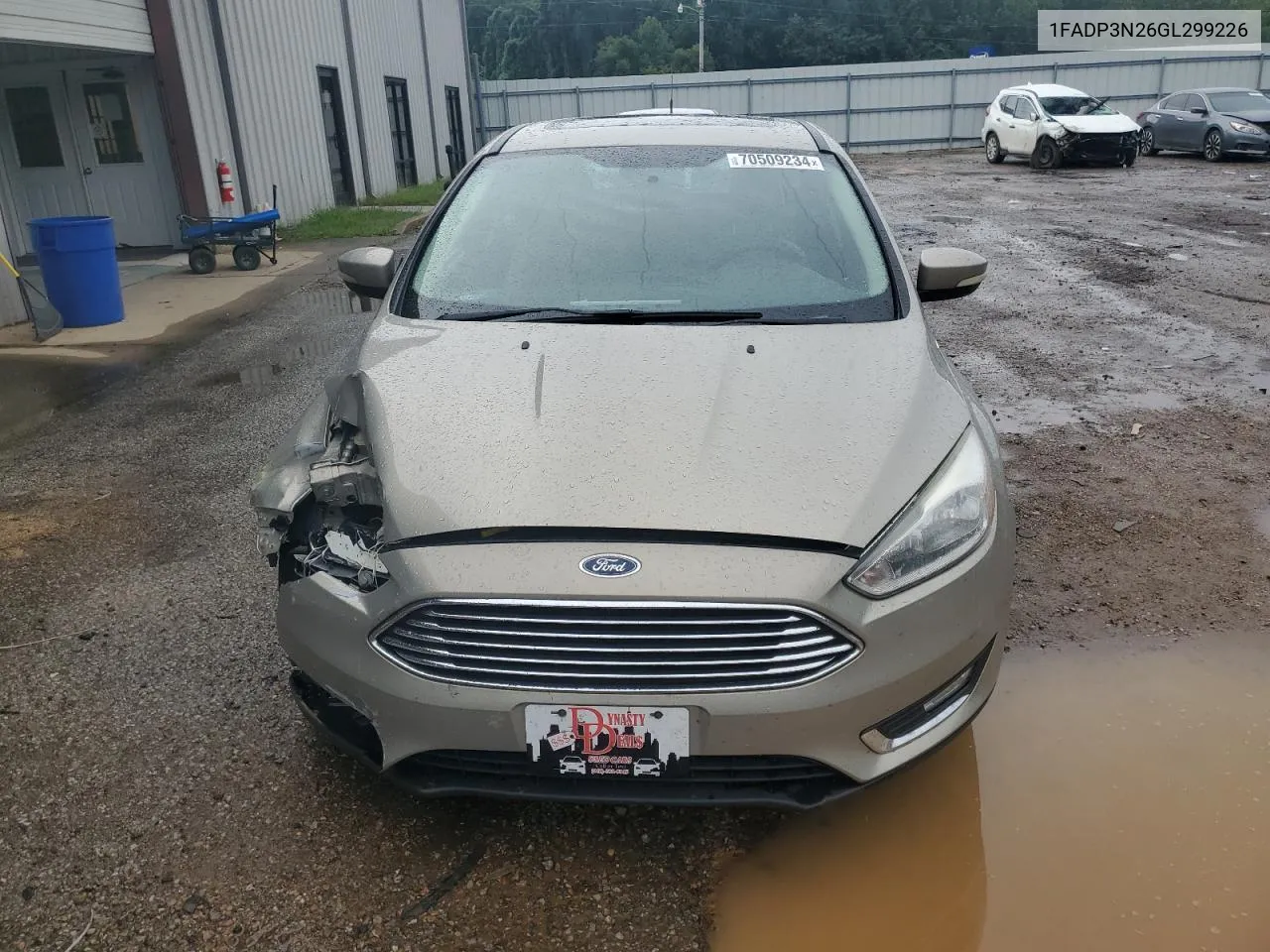 2016 Ford Focus Titanium VIN: 1FADP3N26GL299226 Lot: 70509234