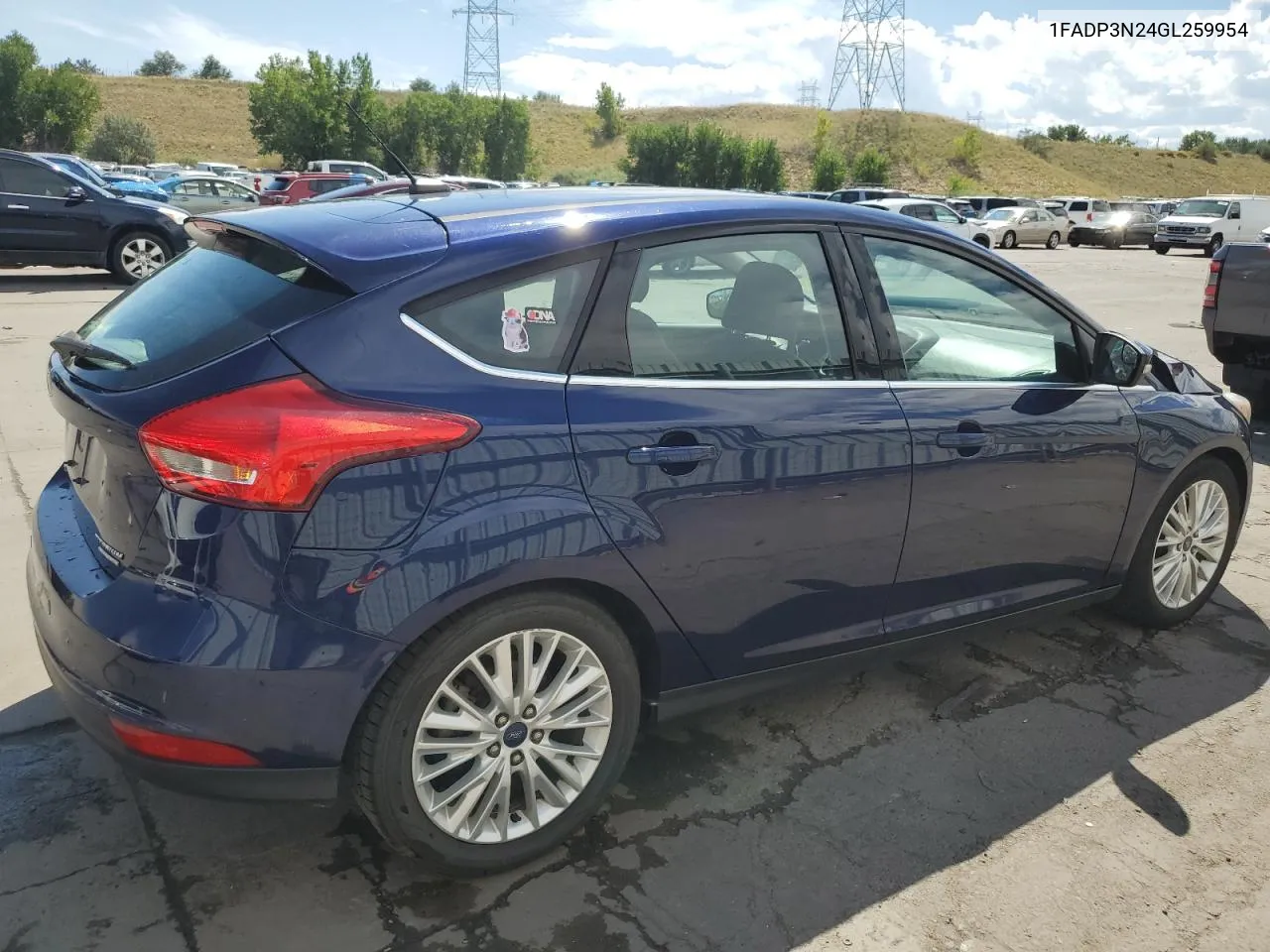 2016 Ford Focus Titanium VIN: 1FADP3N24GL259954 Lot: 70718364