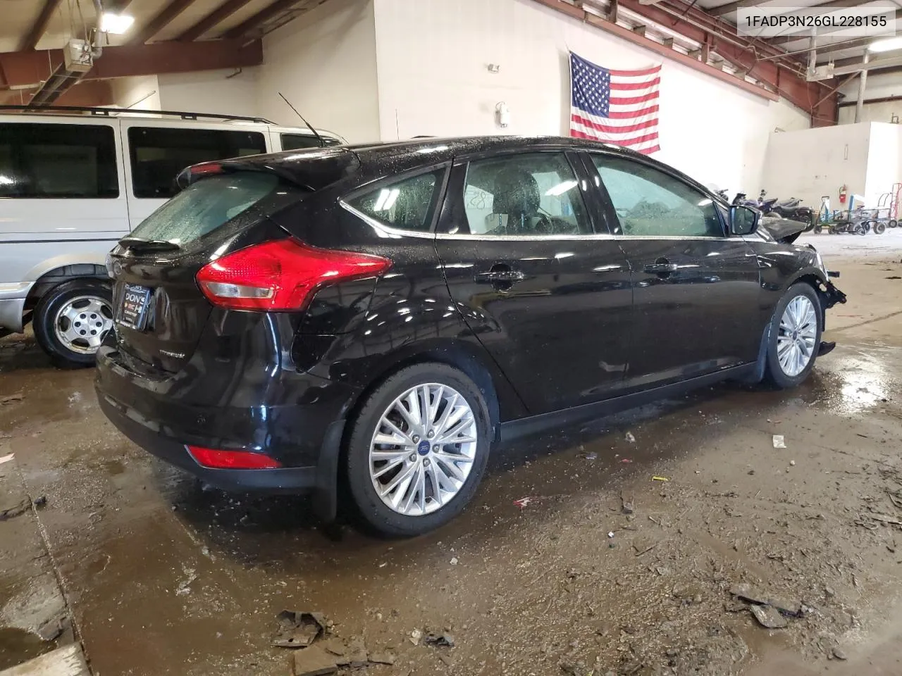 2016 Ford Focus Titanium VIN: 1FADP3N26GL228155 Lot: 71077844