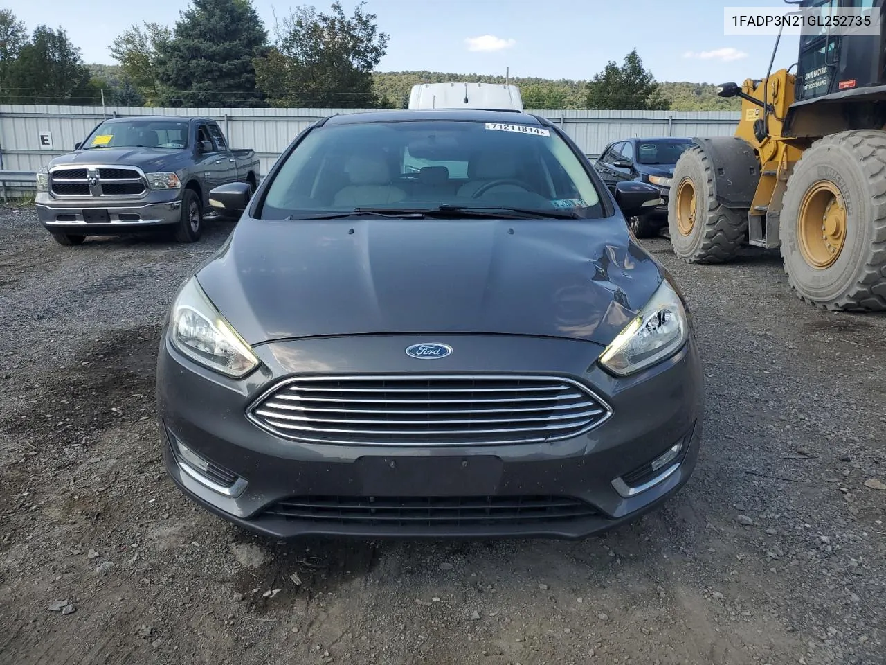 2016 Ford Focus Titanium VIN: 1FADP3N21GL252735 Lot: 71211814